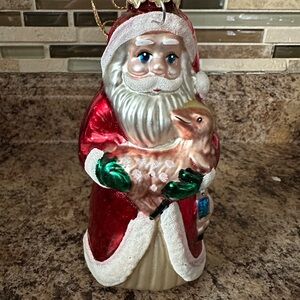 Festive Santa Claus Ornament with Red and Green Details